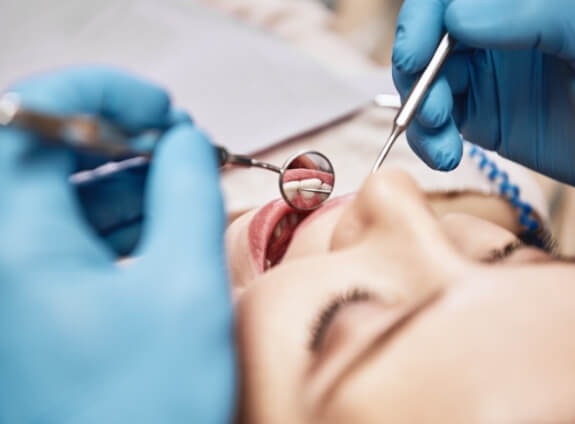 Person receiving a dental exam